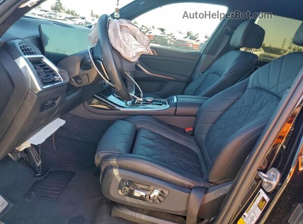5UX23EM07P9R84856 2023 BMW X7 Черный Вид салона спереди