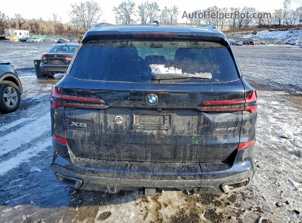 5UX23EU02T9050565 2026 BMW X5 Black Widok z tyłu