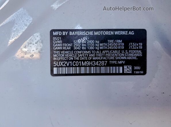 5UX2V1C01M9H34287 2021 BMW X4 White Widok naklejki z numerem VIN