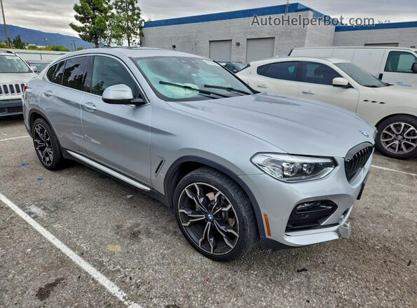 5UX2V1C03L9B28634 2020 BMW X4 Серебряный Передняя правая четверть