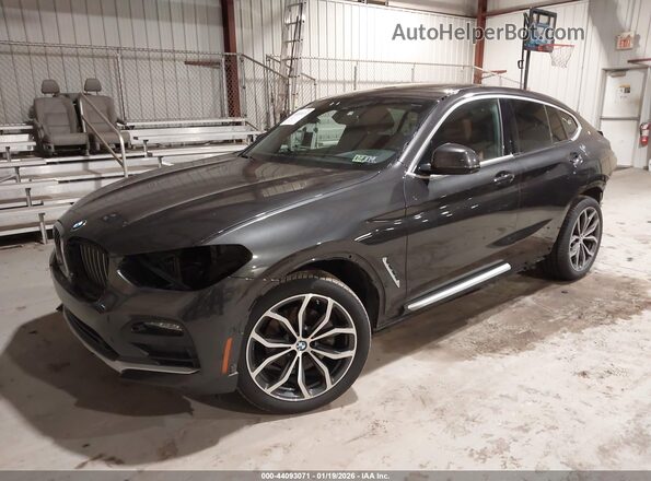 5UX2V1C04M9D87148 2021 BMW X4 Gray Vista tres cuartos delantera izquierda