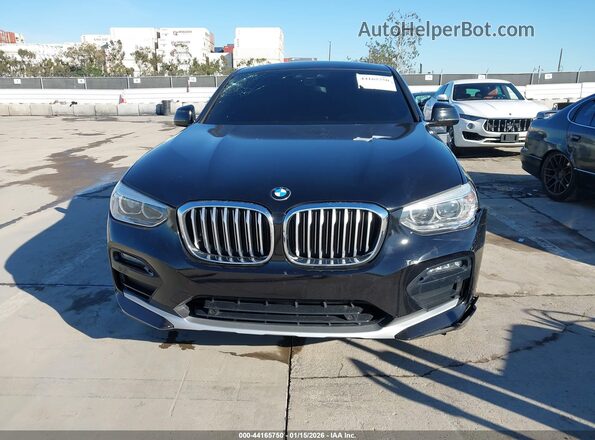 5UX2V1C08M9H06874 2021 BMW X4 Черный Вид задней части салона