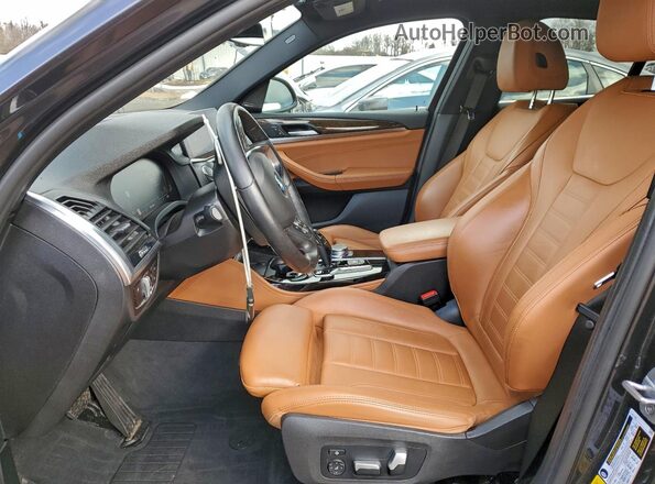 5UX2V1C09M9D82561 2021 BMW X4 Серый Вид салона спереди