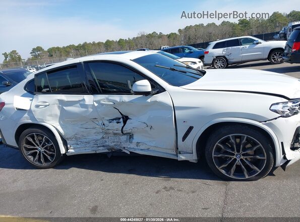5UX33DT02P9N55057 2023 BMW X4 White Widok wnętrza z tyłu
