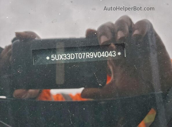 5UX33DT07R9V04043 2024 BMW X4 Black Widok naklejki z numerem VIN