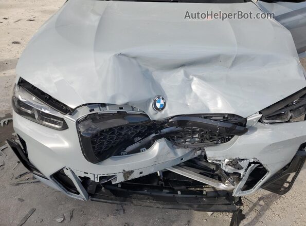 5UX33DT08S9Y22341 2025 BMW X4 Gray Vista del compartimento del motor