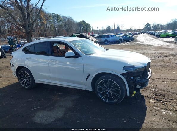 5UX33DT09P9P80799 2023 BMW X4 White Vista interior trasera