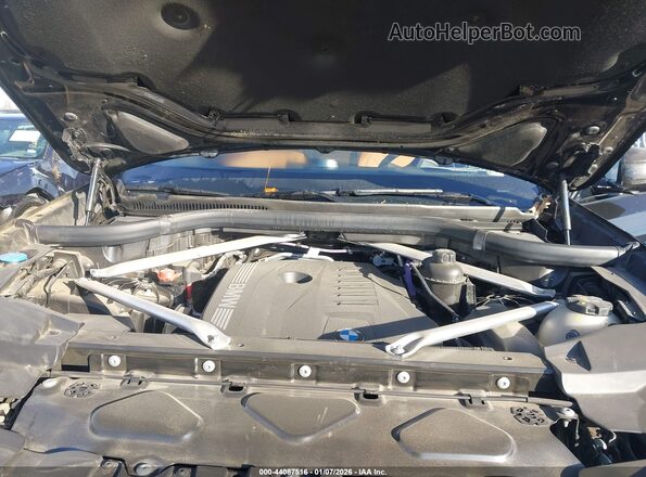 5UX33EX02R9T85883 2024 BMW X6 Black Հետևի տեսք