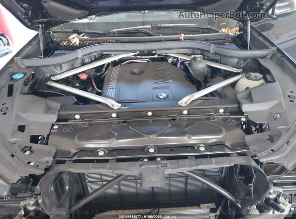 5UX33EX02R9U97955 2024 BMW X6 Dark Blue Widok z tyłu