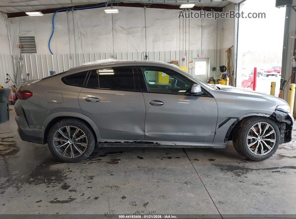 5UX33EX05S9Z55414 2025 BMW X6 Серый Вид задней части салона