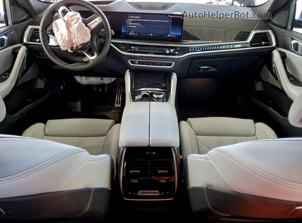 5UX33EX07T9155845 2026 BMW X6 Blue Вид панелі приладів