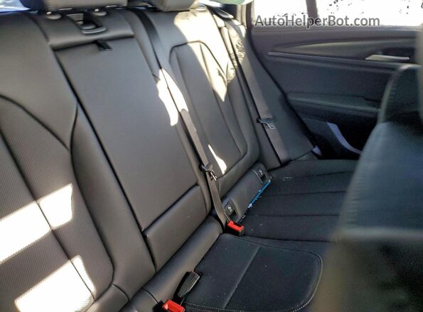 5UX43DT02S9241048 2025 BMW X4 Серый Вид задней части салона
