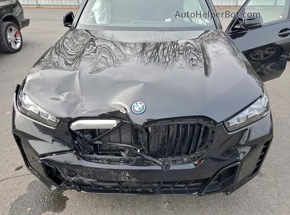 5UX43EU05T9026396 2026 BMW X5 Black Вид задньої частини салону
