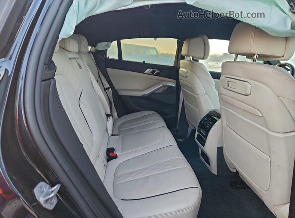 5UX43EX09S9Y85775 2025 BMW X6 Черный Вид задней части салона