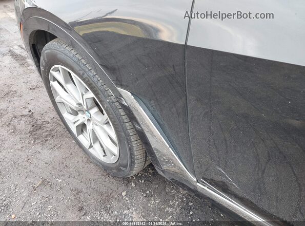 5UXCW2C55KL086081 2019 BMW X7 Black Widok z przodu