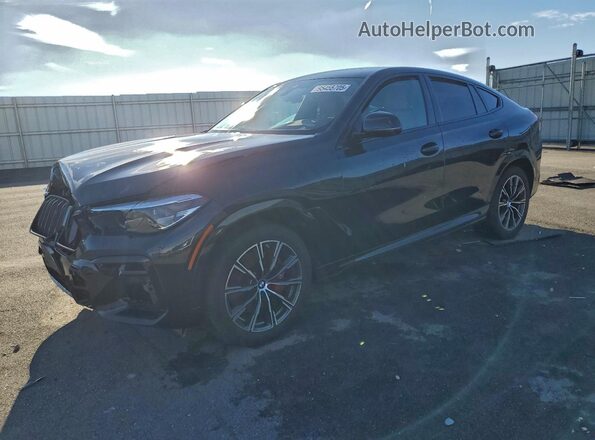 5UXCY6C01P9R02519 2023 BMW X6 Black Առջևի ձախ երեք քառորդ տեսարան