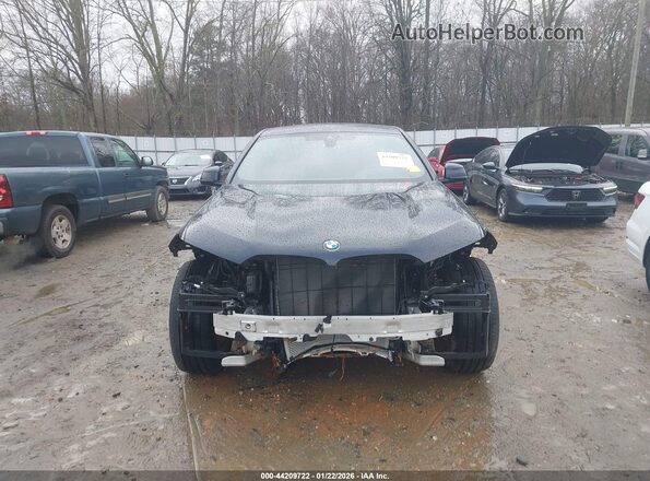 5UXCY6C05P9P80151 2023 BMW X6 Черный Вид задней части салона