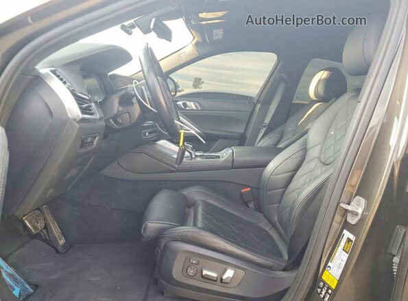 5UXCY6C07P9R94932 2023 BMW X6 Зеленый Вид салона спереди