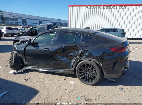 5UXCY8C03N9K75041 2022 BMW X6 Черный Вид задней части салона
