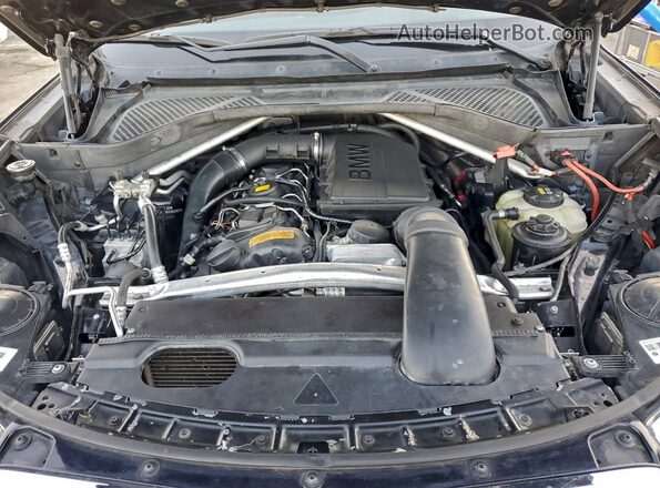5UXKU2C56G0N83165 2016 BMW X6 Черный Вид задней части салона