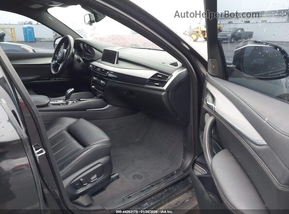 5UXKU2C56J0Z62089 2018 BMW X6 Черный Вид салона спереди