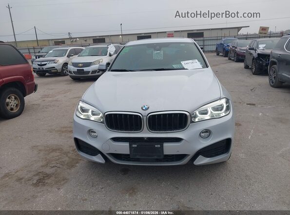 5UXKU2C56J0Z62450 2018 BMW X6 Серый Вид задней части салона