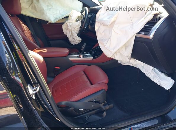 5UXUJ5C53KLJ62823 2019 BMW X4 Черный Вид салона спереди