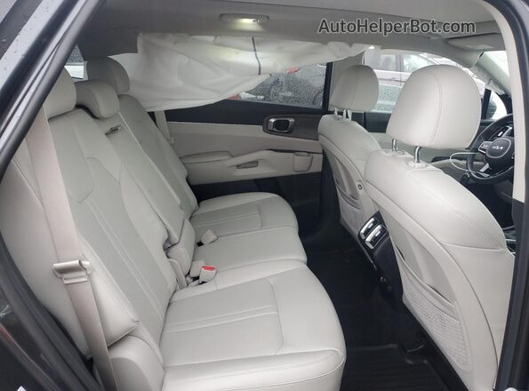 5XYRLDLC4PG230897 2023 KIA SORENTO Угольный Вид задней части салона