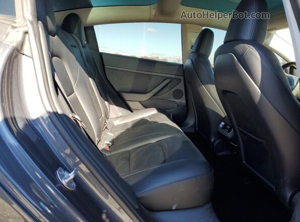 5YJ3E1EB5PF634530 2023 TESLA MODEL Silver Rear seats view