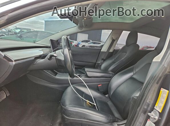 5YJ3E1EB9JF128450 2018 TESLA MODEL Charcoal Widok wnętrza z przodu