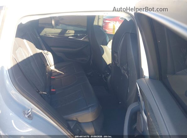 5YM23EC03R9U11806 2024 BMW X4 Light Blue Widok naklejki z numerem VIN