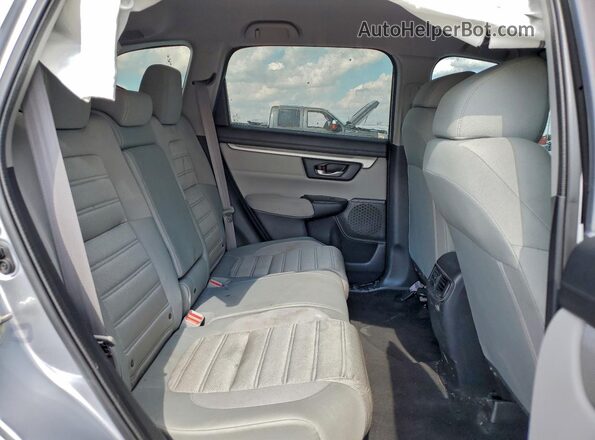 2HKRW5H34KH422683 2019 HONDA CRV Серебряный Вид задней части салона