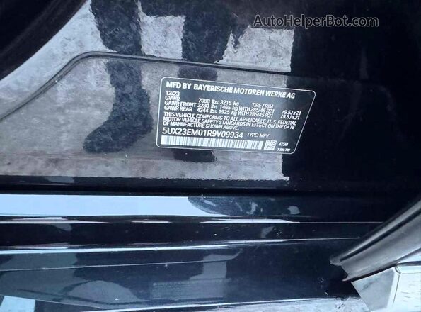 5UX23EM01R9V09934 2024 BMW X7 Black Вид задньої частини салону