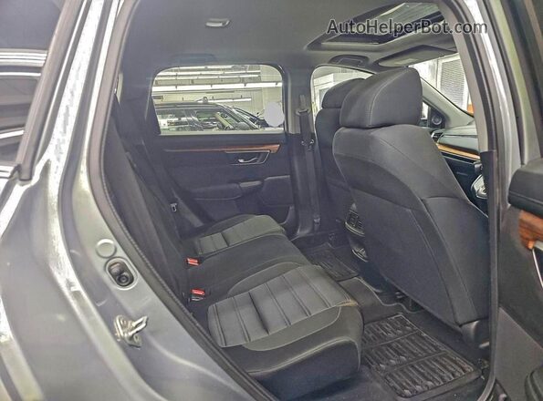 7FARW2H57KE010518 2019 HONDA CRV Серебряный Вид салона спереди