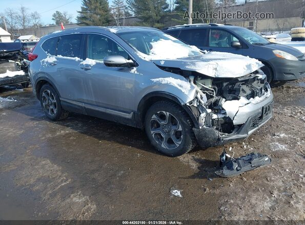 7FARW2H9XJE063666 2018 HONDA CR-V Серебряный Передняя правая четверть