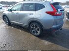 2018 Honda Cr-v Touring Серебряный vin: 7FARW2H9XJE063666