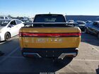2023 Rivian R1t Adventure Quad Motor Large Pack Желтый vin: 7FCTGAAA2PN019677