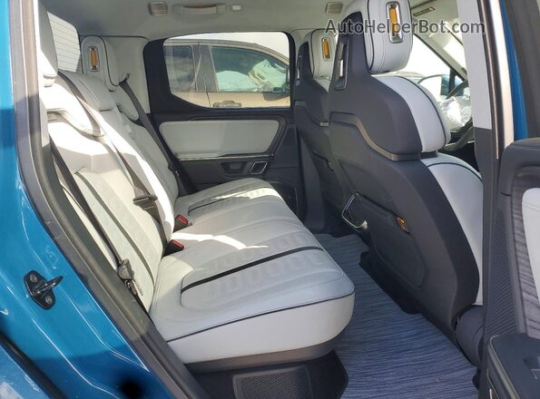 7FCTGAAA4PN020846 2023 RIVIAN R1T Blue უკანა სავარძლების ხედი