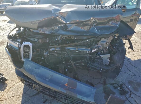 7FCTGCAP6SN039178 2025 RIVIAN R1T Gray Вид задньої частини салону