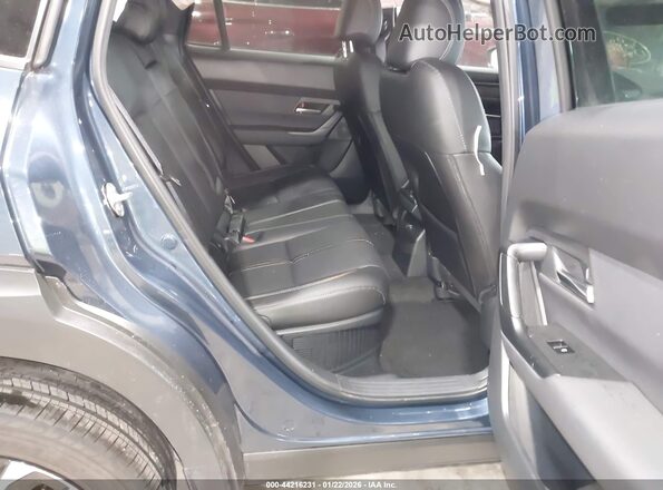 7MMVAAEWXSN142173 2025 MAZDA CX-50 HYBRID Blue Вид наклейки з VIN-кодом
