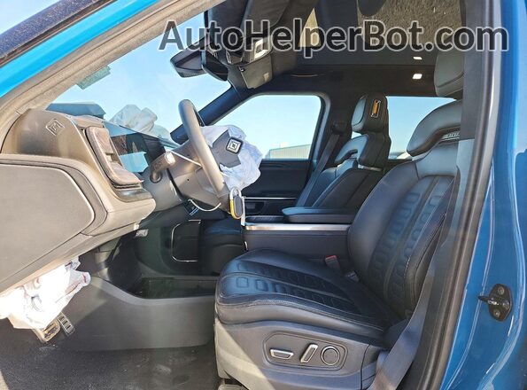 7PDSGABA6PN018752 2023 RIVIAN R1S Синий Вид салона спереди