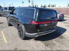 2024 Rivian R1s Adventure Quad Motor Large Pack Black vin: 7PDSGABA6RN038728
