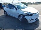 2023 Tesla Model Y Awd/long Range Dual Motor All-wheel Drive White vin: 7SAYGAEE1PF789444