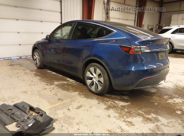7SAYGAEE8PF783897 2023 TESLA MODEL Y Blue Tył lewy