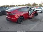 2024 Tesla Model Y Rwd Burgundy vin: 7SAYGDED6RF129542
