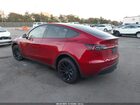 2024 Tesla Model Y Rwd Burgundy vin: 7SAYGDED6RF129542
