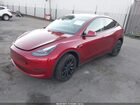 2024 Tesla Model Y Rwd Burgundy vin: 7SAYGDED6RF129542