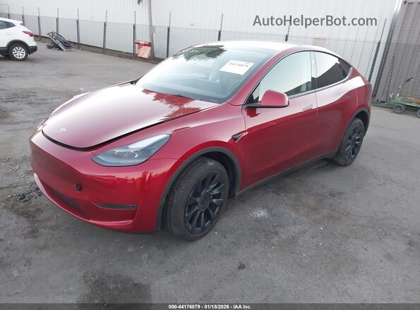 7SAYGDED6RF129542 2024 TESLA MODEL Y Burgundy Передня ліва чверть