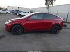 2024 Tesla Model Y Rwd Burgundy vin: 7SAYGDED6RF129542