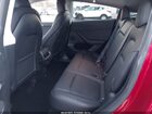 2024 Tesla Model Y Rwd Burgundy vin: 7SAYGDED6RF129542